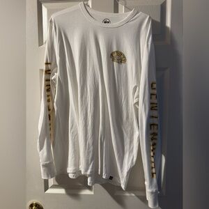 Boston Bruins White Long Sleeve Shirt with lettering on both sleeves. NWT